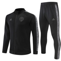 Манчестер Юнайтед детский спортивный костюм чёрный 2022-2023