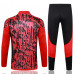 Манчестер Юнайтед тренировочный костюм 2023/24 красно-чёрный с узорами